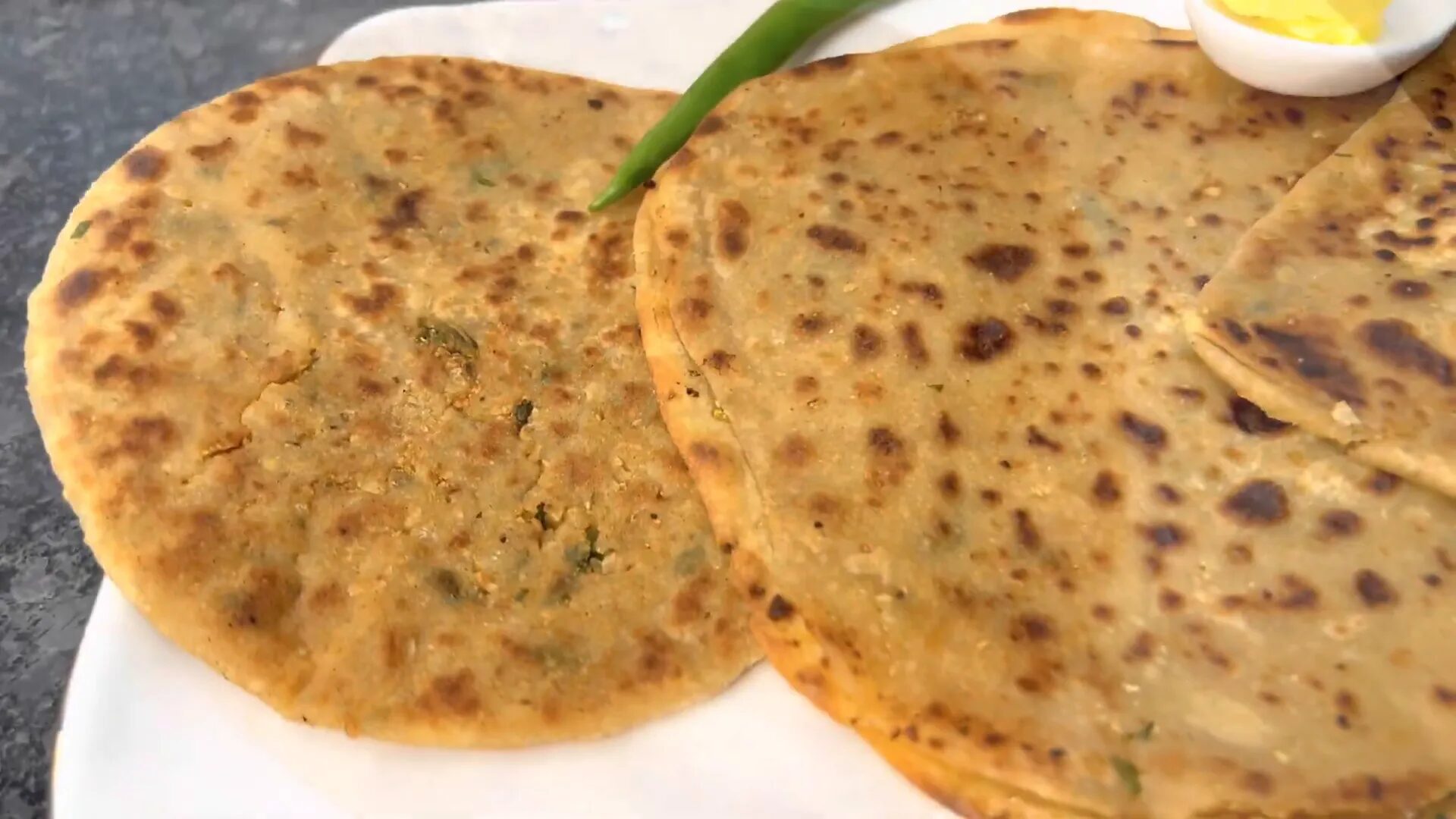 Cooking traditional pocket parantha