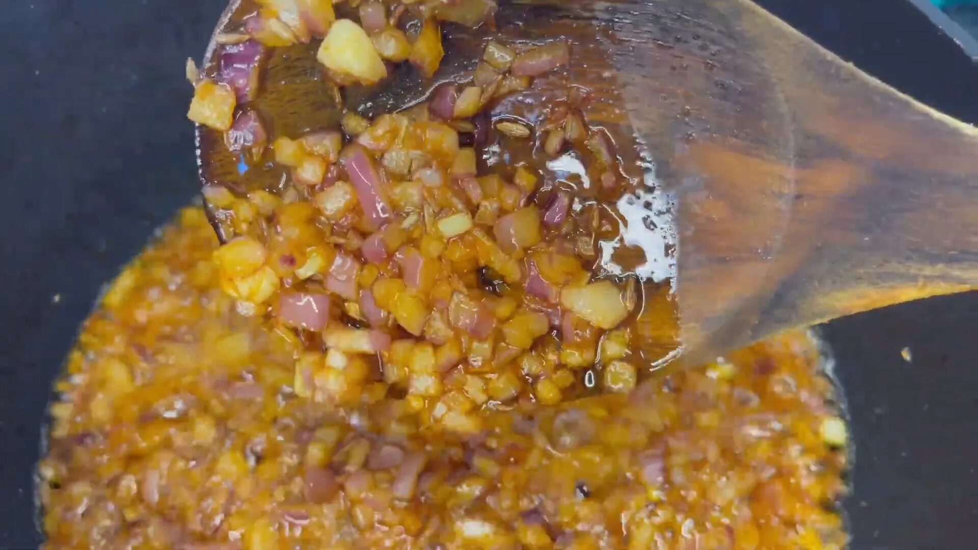 Adding tomatoes and spices